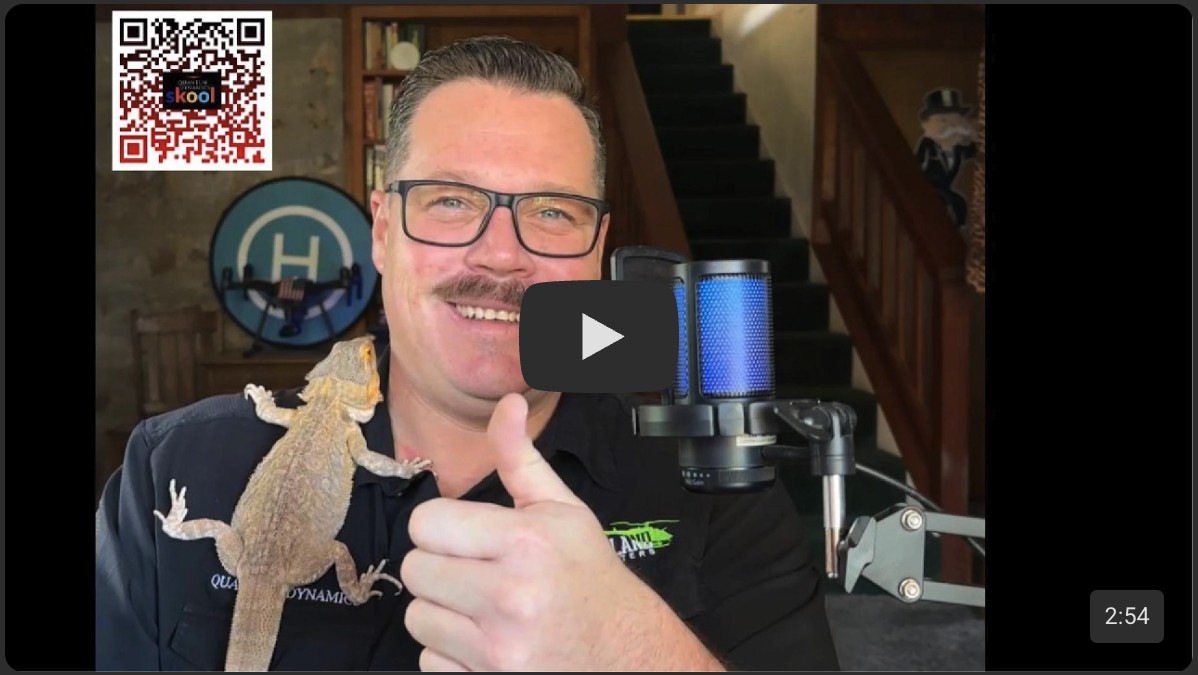 Sean McKay Holt in the Part 107 course introduction video on Skool, with Baron Bungy Burgundy, a bearded dragon, perched on his shoulder