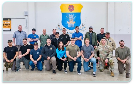 Task Force Almeda Class 001 group photo: the first class of responders trained in unmanned systems for wildfire and disaster response, posed in front of the unit crest